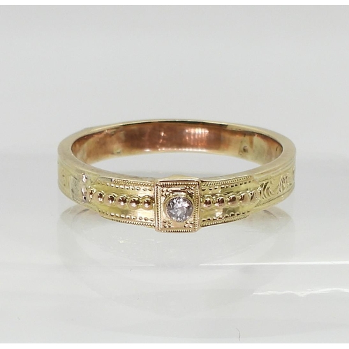 738 - A vintage yellow metal diamond set band ring, set with an estimated approx 0.05ct old cut diamond, f... 