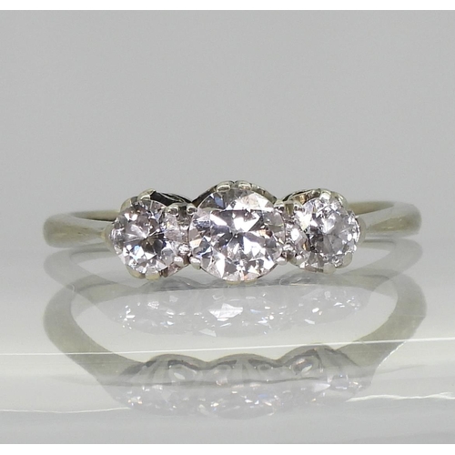 739 - A classic 18ct white gold and platinum three stone diamond ring, set with estimated approx 0.60ct ol... 