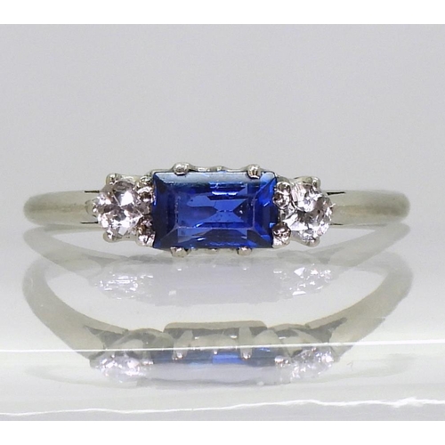 740 - A white metal diamond and sapphire three stone ring, set with estimated approx 0.10cts of old cut di... 