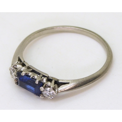 740 - A white metal diamond and sapphire three stone ring, set with estimated approx 0.10cts of old cut di... 