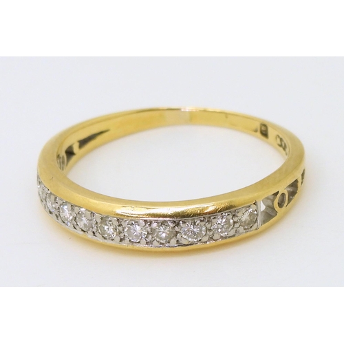 742 - A diamond band ring set with estimated approx 0.16cts of brilliant cut diamonds, finger size P1/2, w... 