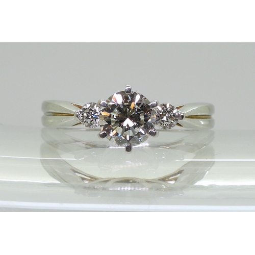 753A - An 18ct white gold The Jewellery Channel 'Iliana' premium brand three stone diamond ring, set with a... 