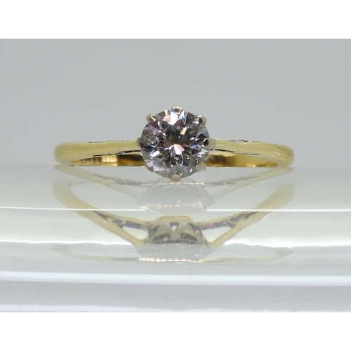 754A - An 18ct gold diamond solitaire ring, set with an estimated approx 0.60ct diamond, finger size P, wei... 