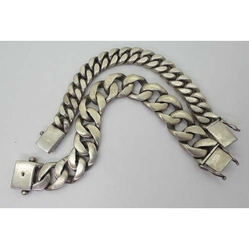 761 - Two heavy silver curb chain bracelets both stamped 925, the bigger one is 21cm, long, the other 19cm... 