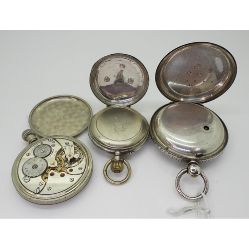 763 - A large silver pocket watch with a decorative dial, diameter 5.8cm, London hallmarks for 1890, a con... 