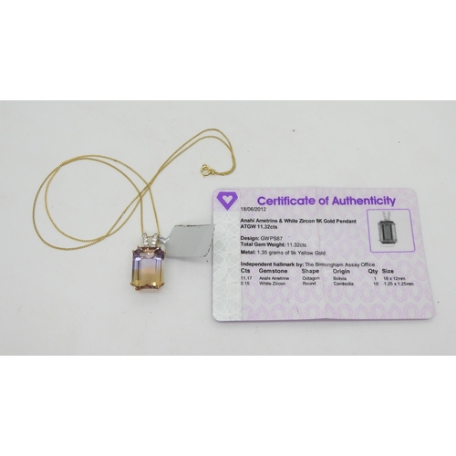 788 - A 9ct gold 16mm x 12mm ametrine and white zircon pendant, and chain, weight 4.3, with tag and certif... 