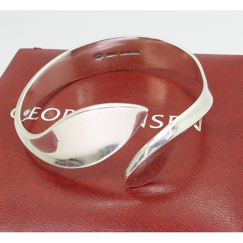 791 - A Georg Jensen silver leaf design bangle, stamped Georg Jensen Danmark, in original box.