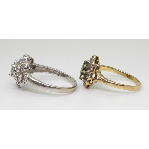 809 - A 9ct white gold aquamarine and diamond ring, size T1/2, and a peridot and diamond cluster ring set ... 