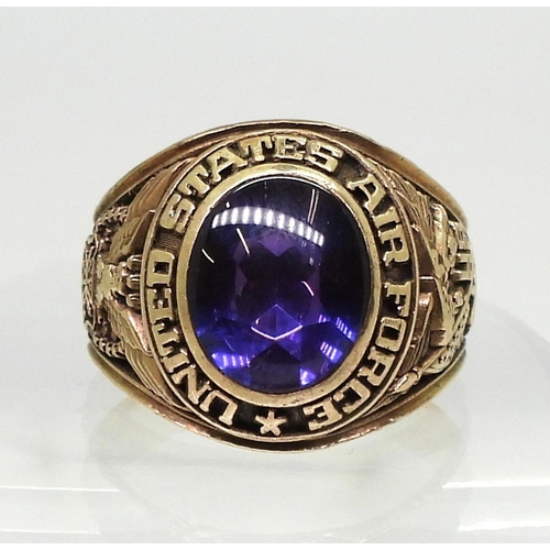 A 10k gold Air Force college ring, set with a purple gem, size Z +