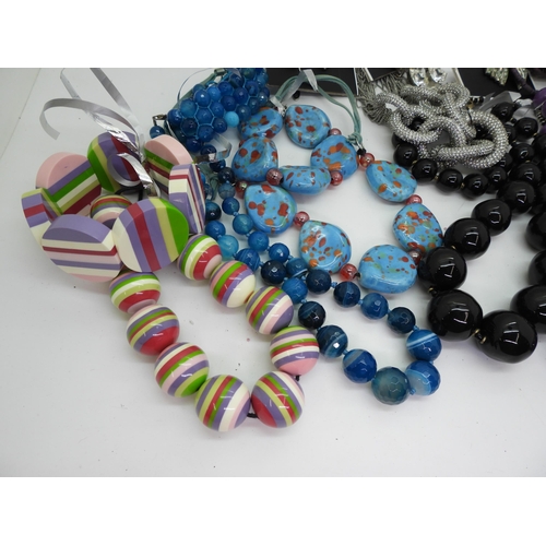 833 - Two Sobral style acrylic necklaces with matching bracelets, a blue banded agate necklace and bracele... 