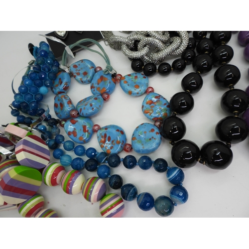 833 - Two Sobral style acrylic necklaces with matching bracelets, a blue banded agate necklace and bracele... 