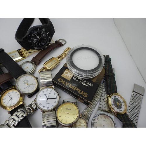 842 - A collection of fashion watches to include Uno, Accurist, Sekonda and Casio, together with an Olympu... 