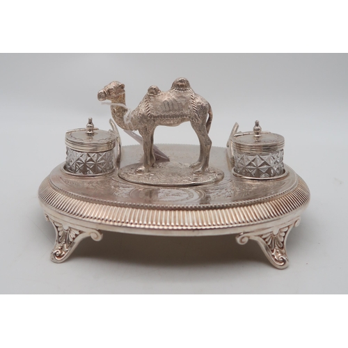 325 - A Victorian silver-plated Egyptian revival inkstand, by James Deakin & Son, of oval form, with t... 