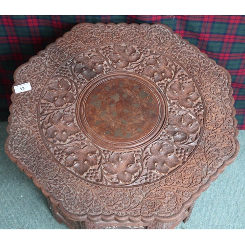 13 - A 20th century carved Anglo-Indian style octagonal table, 55cm high x 53cm wide x 53cm deep