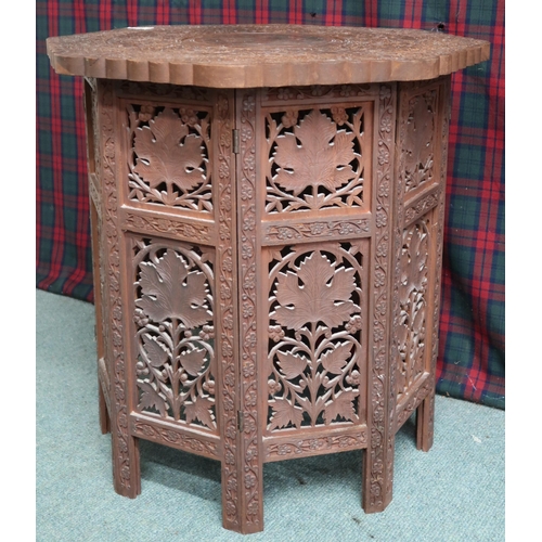 13 - A 20th century carved Anglo-Indian style octagonal table, 55cm high x 53cm wide x 53cm deep