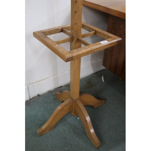 49 - A mid 20th century blonde oak coat/umbrella stand with copper coat hooks, 180cm high