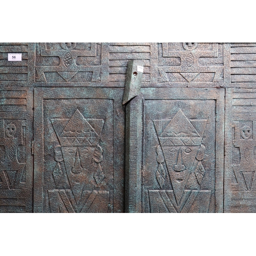 56 - A 20th century faux stone Aztec style two door cabinet, 150cm high x 85cm wide x 29cm deep