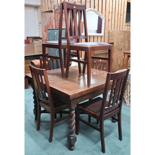 66 - An early 20th century oak barley twist pull out extending dining table and six chairs, table, 76cm h... 