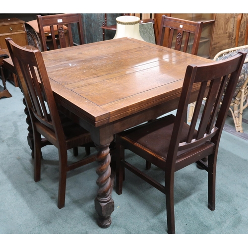 66 - An early 20th century oak barley twist pull out extending dining table and six chairs, table, 76cm h... 