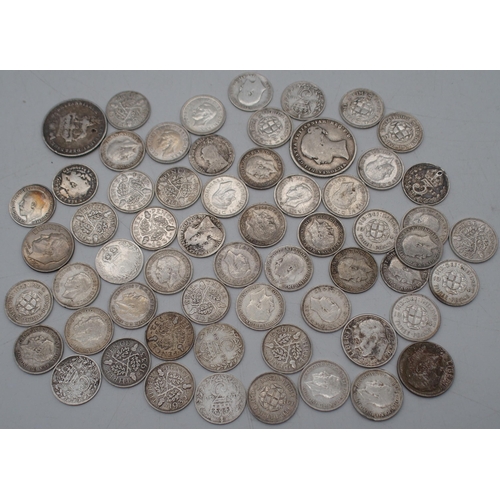 335 - A small collection of three penny coins with together with a Victorian shilling, Great Britain The C... 