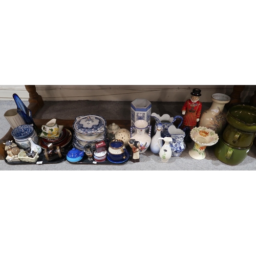 150 - A collection of decorative ceramics including blue and white, a Carlton Ware Beefeater Yeoman figure... 