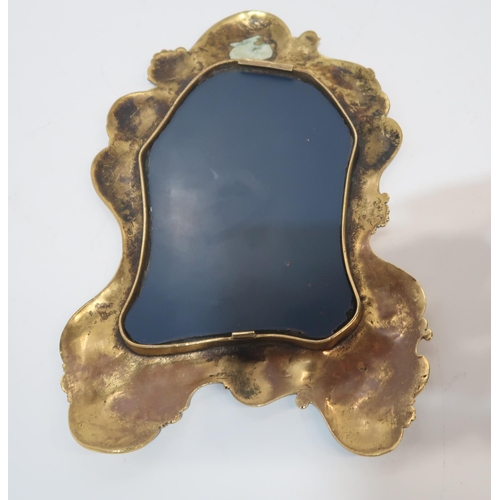 185 - A champleve enamelled mirror, of rococo style