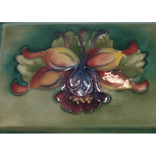 204 - A Moorcroft Columbine pattern rectangular box and cover