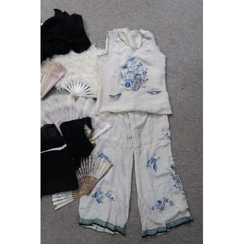 232 - Assorted ostrich fans, embroidered two piece trouser and top set, silk house coat and a Chinese embr... 