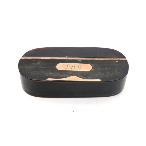 395 - A tortoiseshell snuffbox with yellow metal hardware, the lid inset with a plaque engraved 