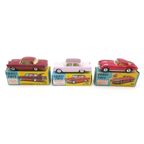 428 - A Corgi Tourist Portable Service Station case, containing eighteen boxed Corgi vehicles -314 Ferrari... 