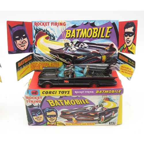 437 - Two Corgi 267 Batman Batmobiles, one retaining outer box and inner card tray, the other with inner t... 