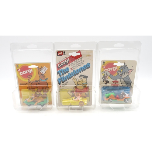 443 - Corgi Junior model vehicles from cartoon shows of the 1970s and 80s, comprising 38 and 58 Tom & ... 