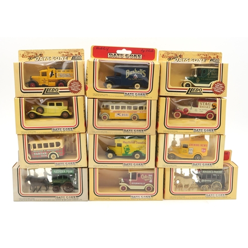 453 - A collection of boxed die-cast model vehicles, largely the Lledo Days Gone series, together with a 1... 