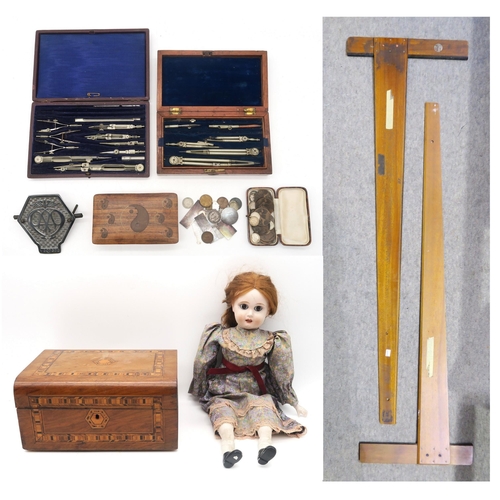 462 - Two cased sets of draughtsman's instruments, two large drawing squares, a chrome AA grille badge, mi... 