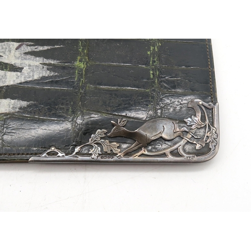 460 - A leather wallet with Birmingham silver mount, Orthodox Christian triptych icon, a small selection o... 