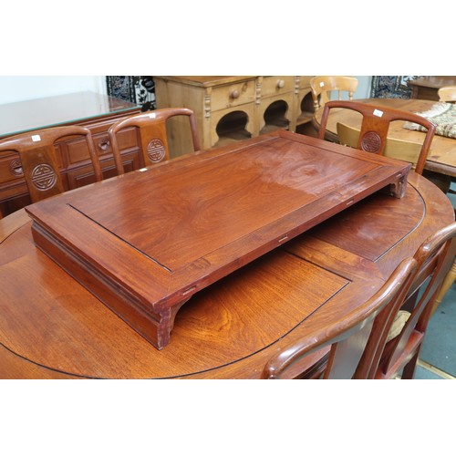 35 - A 20th century Chinese hardwood D end extending dining table and eight chairs, table with shaped fri... 