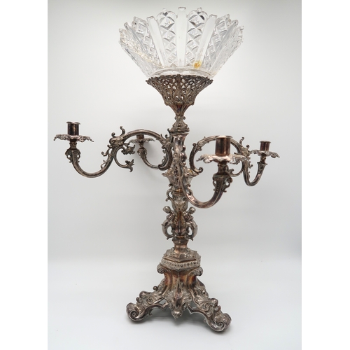 2420 - AN IMPRESSIVE SILVER-PLATED VICTORIAN FOUR BRANCH CANDELABRUM CENTREPIECEthe knopped baluster stem f... 