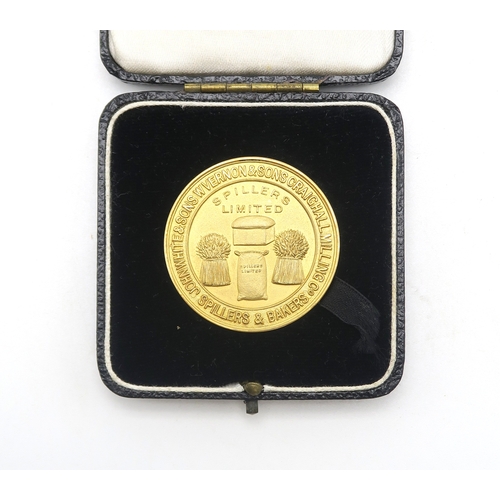 2606 - A 9ct GOLD SPILLERS LIMITED BAKING PRESENTATION MEDALCast By the Alexander Clark Co. Ltd., Birmingha... 