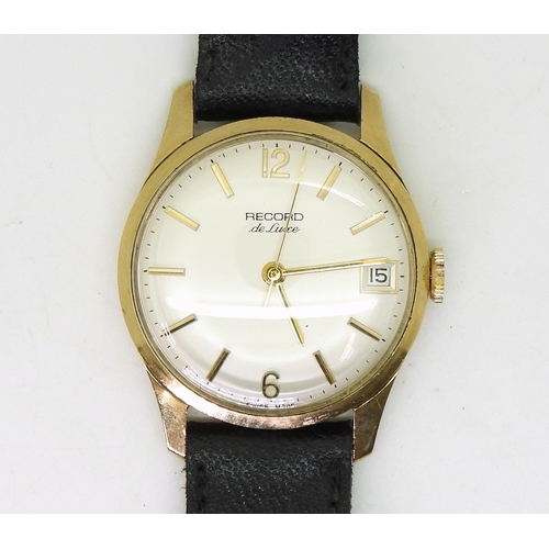 726 - A 9ct gold Record De Luxe, gents wristwatch with black leather strap, diameter of the dial 3.3cm, we... 