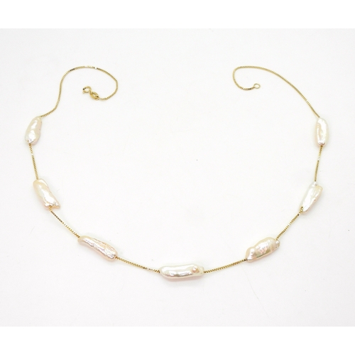2701 - AN 18K GOLD PEARL NECKLACEfrom the Jewellery Channels premier Brand Illiana, an 18k gold box chain s... 