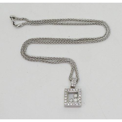 2713 - A 'HAPPY DIAMONDS' STYLE PENDANTmade in Turkey, with certificate from the retailer, the pendant is s... 