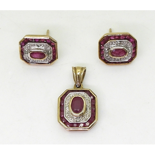 2725 - RUBY AND DIAMOND SETcomprising of a pendant with matching earrings set with oval rubies and diamond ... 