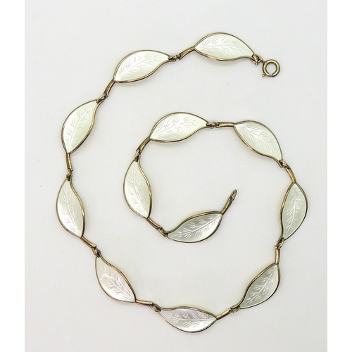 2744 - A DAVID ANDERSEN NECKLACEthe classic white enamelled leaf necklace , is made in gilded sterling silv... 