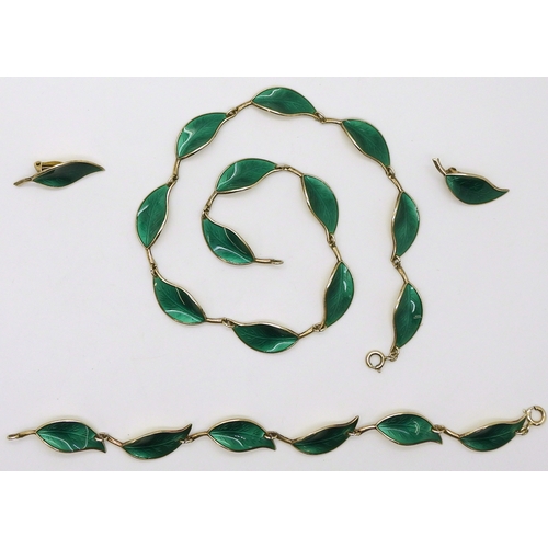 2751 - A DAVID ANDERSEN SUITEhis classic enamelled green leaf design in silver gilt, designed by Willy Winn... 