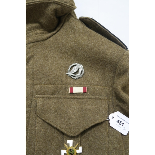 451 - A WW2 British 1941-pattern battledress blouse, bearing Polish insignia to include Light Artillery co... 