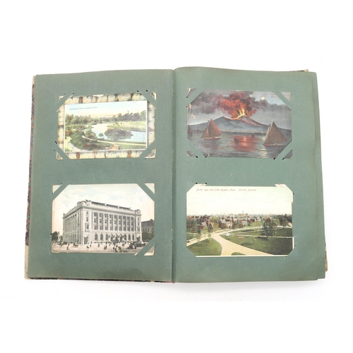 455 - An album of early-20th century postcards, to include views of New York, Ohio, Rome, Calcutta, variou... 