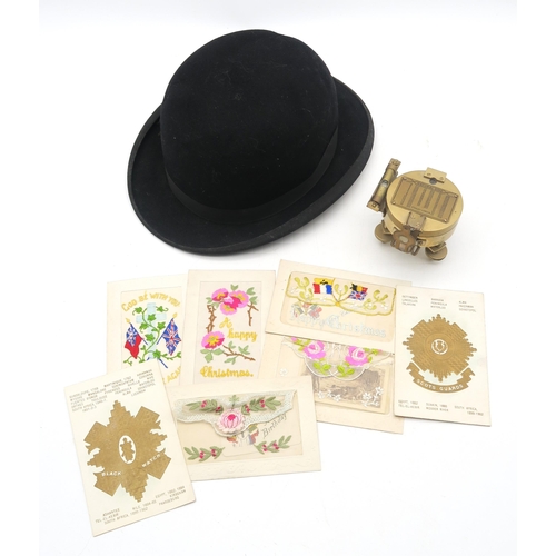 457 - A Stanley Natural Sine brass compass, fur felt bowler hat, WW1-era embroidered postcards, boxed soli... 