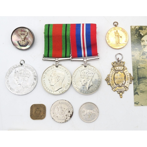 458 - A WW2 War Medal and Defence Medal pair, a sporting medal with obverse engraved 