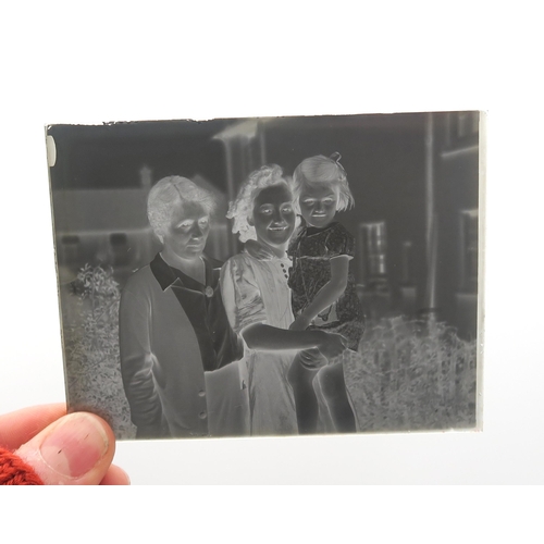 463 - Assorted photographic negative glass plates, including landscape and maritime views, family portrait... 