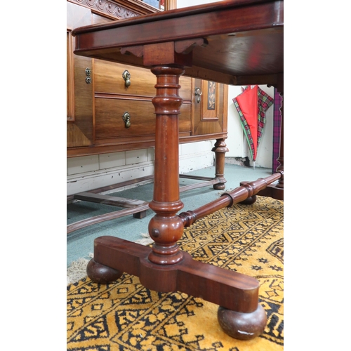 12 - A Victorian mahogany hall table with rectangular top on pair of turned column supports joined by tur... 